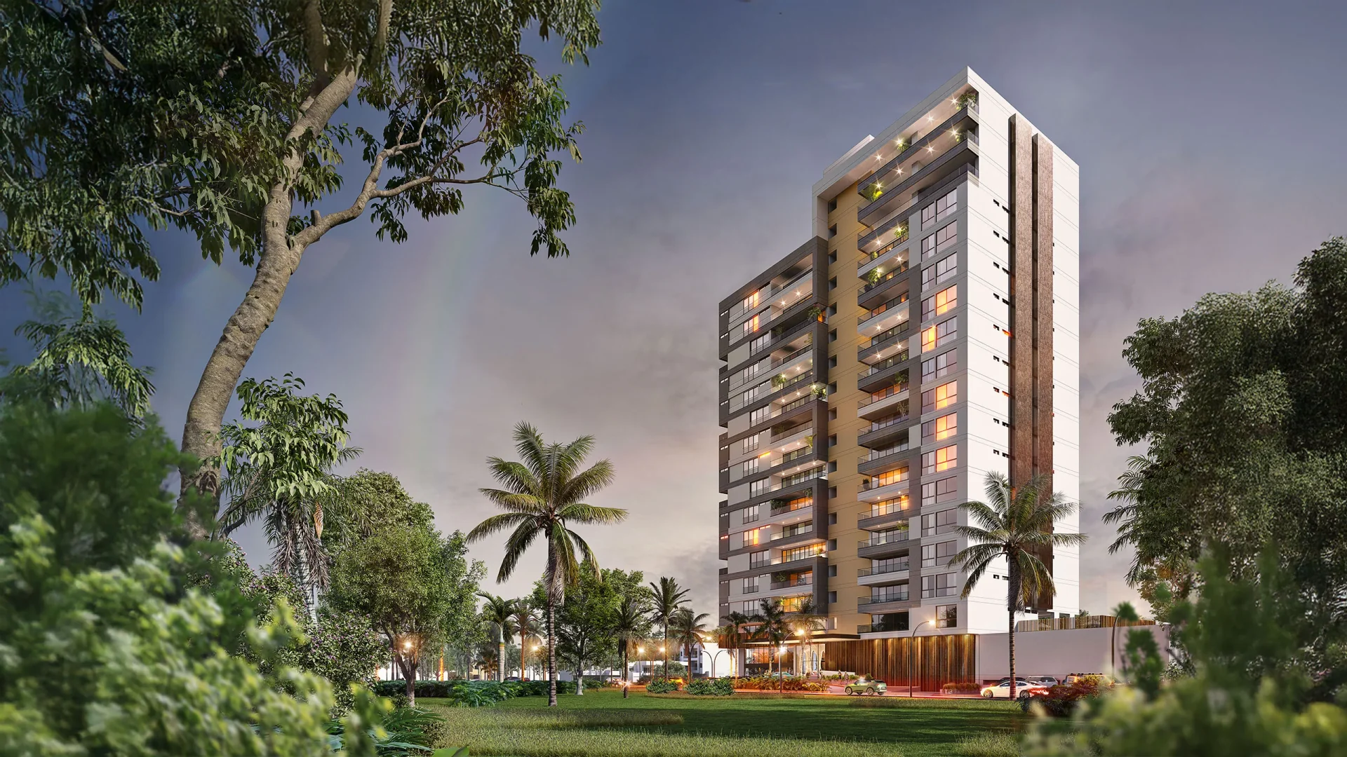 Vista moderna de edificio Rialto con balcones y vegetación